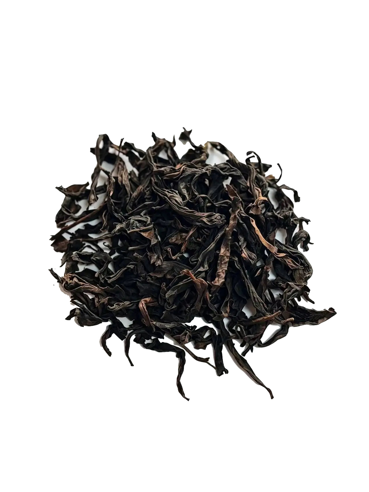 A pile of dark, dried loose-leaf Cinnamon Rock tea leaves on a clean white background.