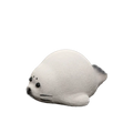 A small ceramic seal tea pet name Niko with a chubby white body, black eyes, and black whiskers, shown against a plain white background.