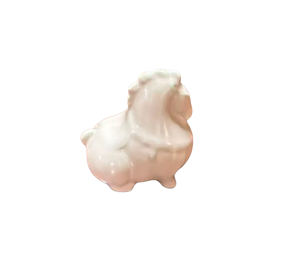 A small glossy ceramic figurine of a pink horse tea pet, shown on a plain white background. 